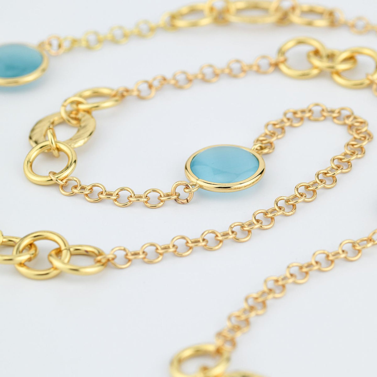 Collana Lunga Boccadamo Mediterranea Bronzo Pvd Oro Elementi Traforati Cristalli Cabochon Azzurri