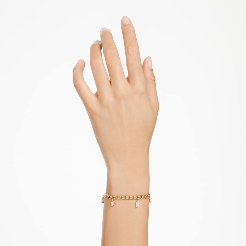 Bracciale Swarovski Dextera con Charms Dangling Finitura oro 18 Kt