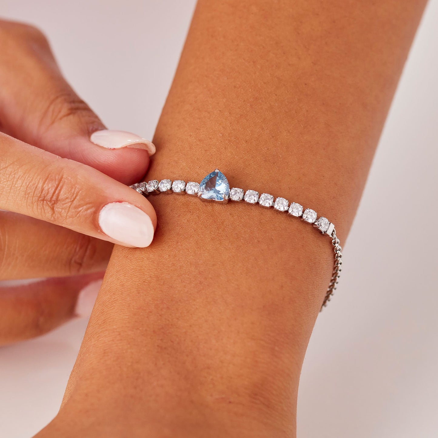 Bracciale Sagapò Dazzly Acciaio Rolò Centrale Tennis Cristalli + Cuore Azzurro