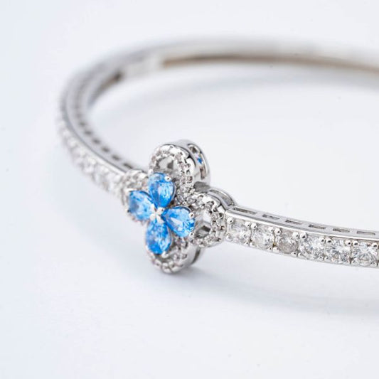 Bracciale Rigido Boccadamo Mediterranea Nexma Bronzo Pvd Bianco Centrale Fiore Cristalli Azzurri Contornati su Mezza Circonferenza